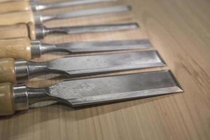 set of chisels on the workbench photo