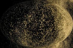 esfera de polvo de estrella dorada foto