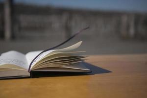 Notebook on the table in nature photo