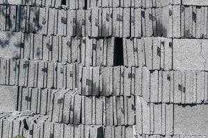 Gray cement cinder block background at site construction photo