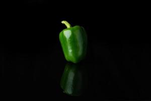 Close up Sweet Pepper on black photo