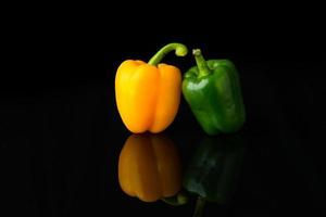 Close up Sweet Pepper on black photo