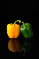 Close up Sweet Pepper on black photo