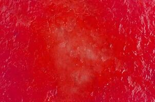 Red color abstract background with dried mango textures photo