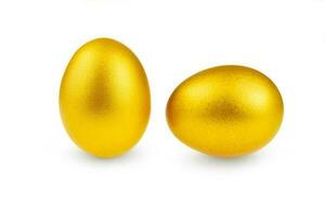 2 egg gold isolated on white background photo