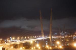 Night landscape with a view of the Golden bridge photo