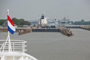 Kiel, Germany - May 23, 2017, Cruise ship passes the Holtenau lock of the Kiel Canal photo