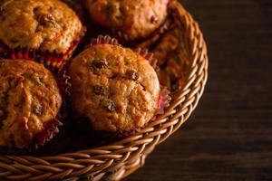 Freshly baked homemade muffins with raisins and carrots photo