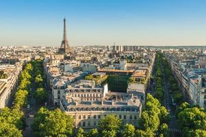 Skyline of Paris with Eiffel tower at dusk photo