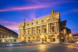 Night view of the Palais Garnier Opera in Paris, France photo