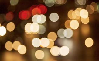 Abstract glitter bokeh from car lights to riot at night beautiful for the background photo