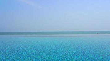 Outdoor swimming pool in hotel resort for vacation video