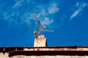 chimney on the rooftop of the house photo