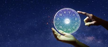 Astrological zodiac signs inside of horoscope circle photo