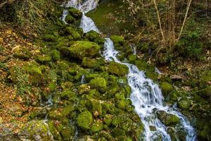 Stream on mountain photo