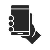 hand with mobile phone or smartphone electronic technology device silhouette style icon