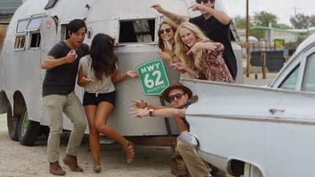 Group of young people on road trip video