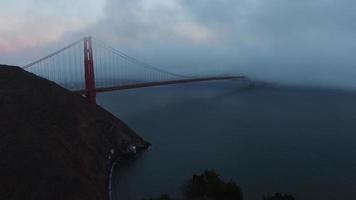 Golden Gate Bridge in evening fog, San Francisco, California, aerial shot
