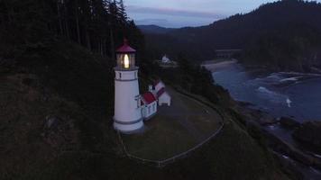 Aerial shot of Heceta Head Lighthouse at sunset, Oregon video