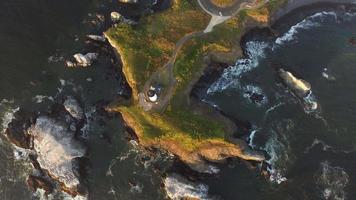 Overhead view of Yaquina Bay Lighthouse at sunset, Newport, Oregon video