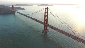 Sunset aerial shot of Golden Gate Bridge in San Francisco, California