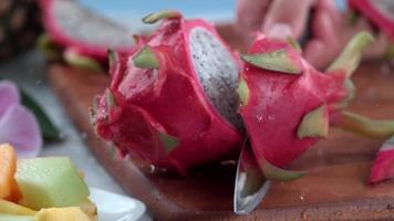 Cutting dragon fruit  , slow motion, shot on Phantom Flex 4K video