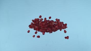 Pomegranate seeds flying in slow motion, shot with Phantom Flex 4K at 1000 frames per second video