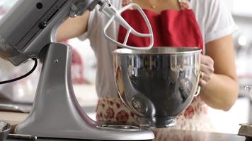 Using electric mixer in kitchen