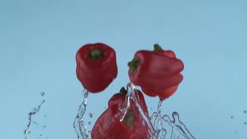 Red peppers flying in slow motion, shot with Phantom Flex 4K at 1000 frames per second video