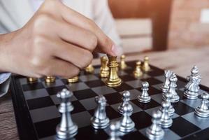 Business competition concept with table chess game photo