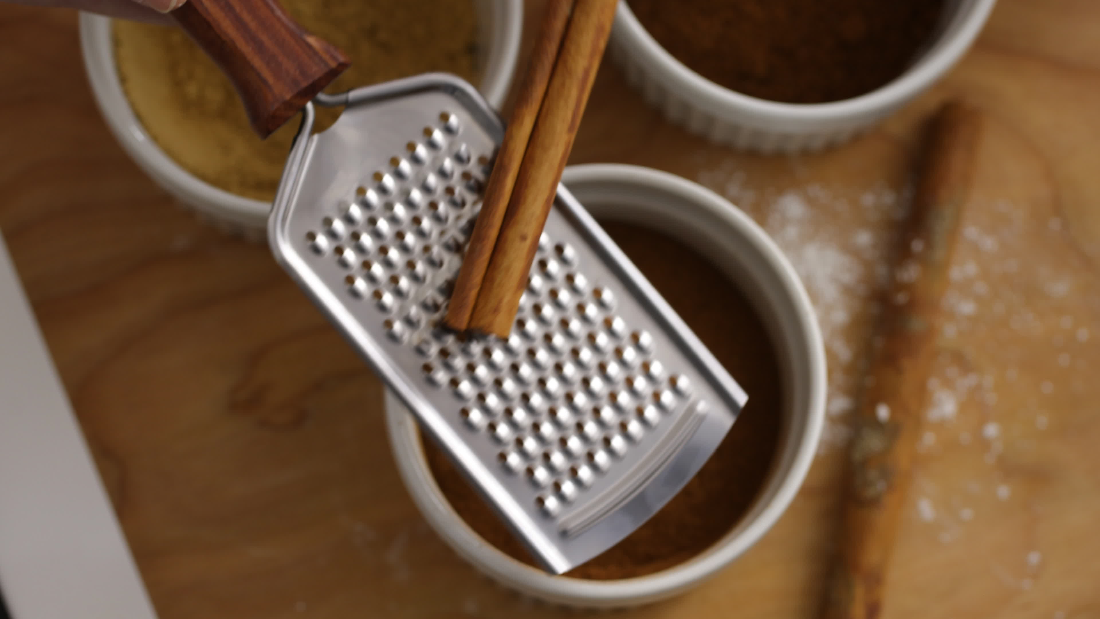 Grinding cinnamon stick in kitchen 2569296 Stock Video at Vecteezy