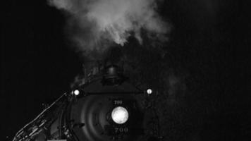 Steam locomotive at night  in black and white video