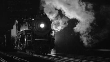 Steam locomotive at night  in black and white video