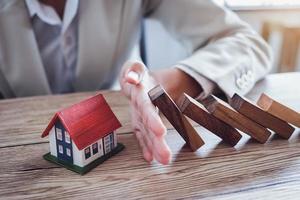 Protect the house from falling over the wooden blocks photo