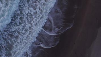Aerial view of beach waves at sunset, Lincoln City, Oregon video