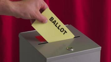 Putting ballot into voting box, election concept video