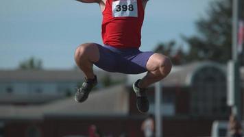 Track athlete doing long jump in super slow motion, shot on Phantom Flex 4K video