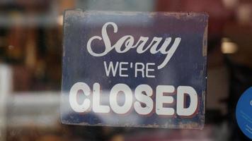 Open sign on window of coffee shop video