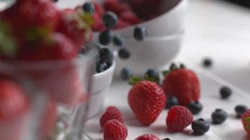 Berries falling into bowl in super slow motion, shot on Phantom Flex 4K video