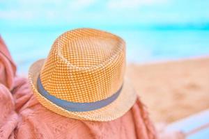 Straw hat on a hot day off photo