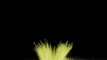 Yellow powder exploding on black background in super slow motion, shot with Phantom Flex 4K video