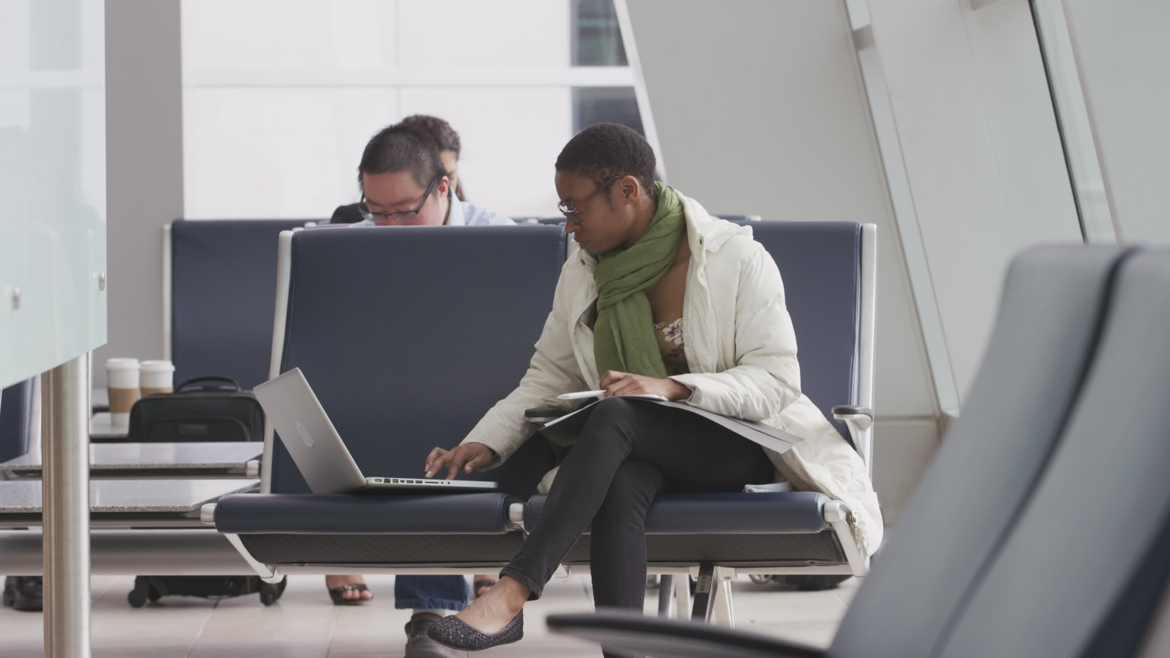 Businesswoman working at airport 2571883 Stock Video at Vecteezy