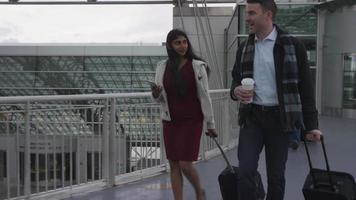 Business people walking at airport video