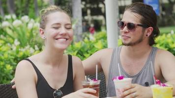 Couple in Hawaii having cocktails video