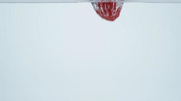 Slow motion shot of raspberries splashing into water, shot with Phantom Flex 4K camera. video