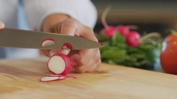 Close up shot of man cutting radish video