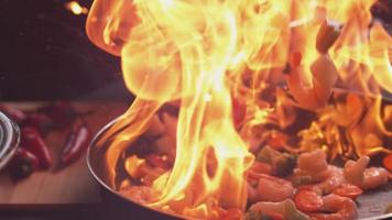 Flaming stir fry in super slow motion shot on Phantom Flex 4K video