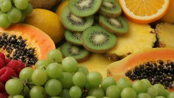 Fondo de frutas frescas, sobrevuela video