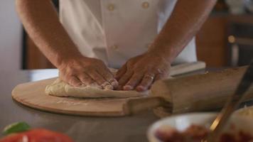 Rolling pizza dough video