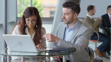 Businesspeople meeting in office lobby video